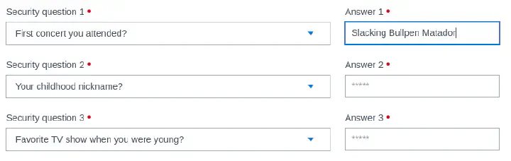 Form with security questions. One security question is "First concert you attended?" and the answer filled in is "Slacking Bullpen Matador".