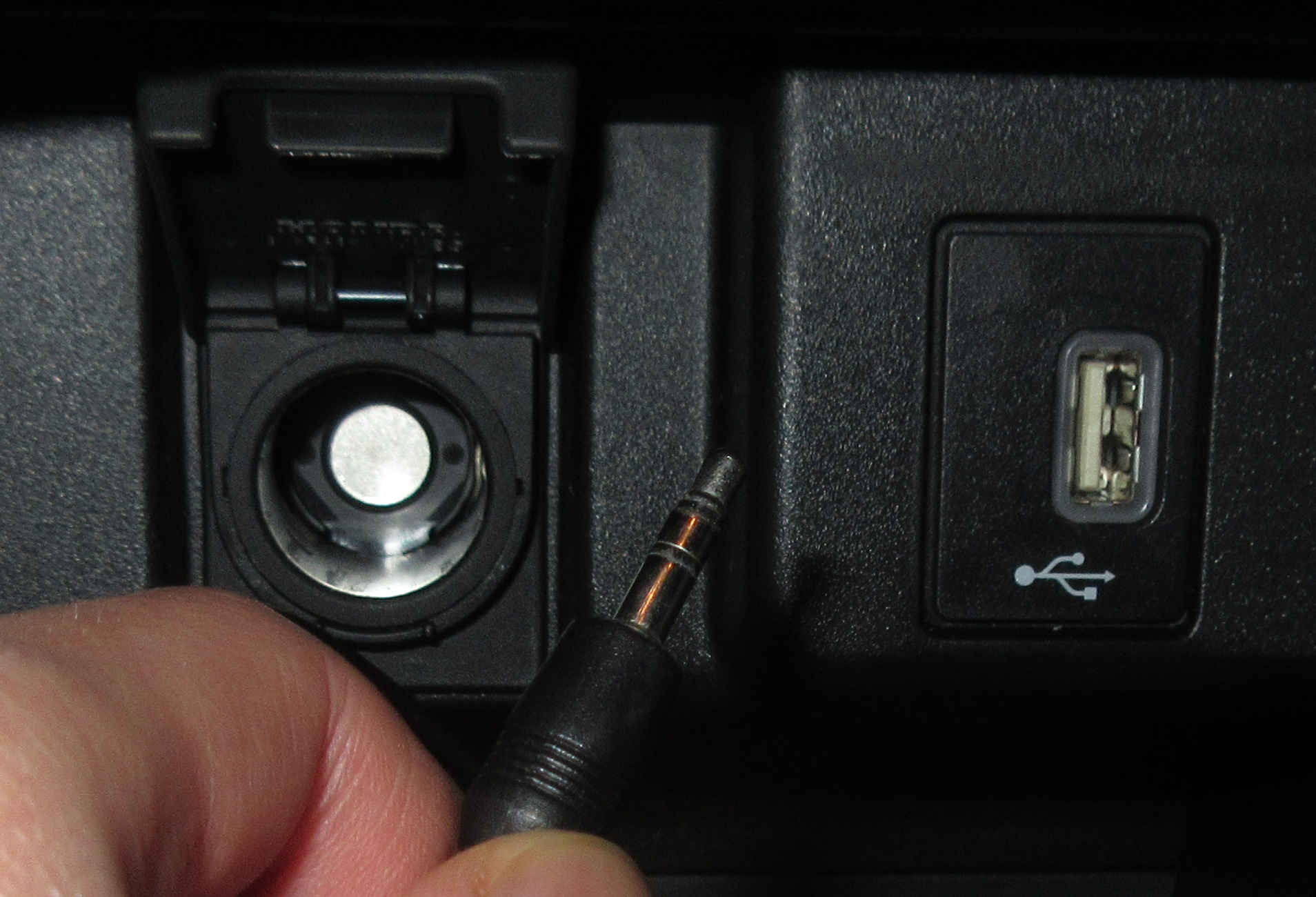 Attempting to connect a headphone jack to car with only a cigarette lighter and a USB port